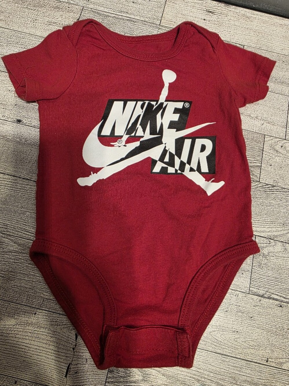 Jordan Red Short-Sleeve One-Piece Bodysuit with White Logo